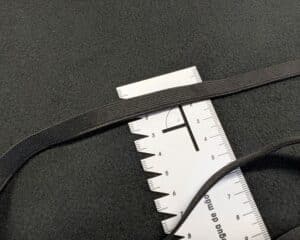 Pesukumm must laiusega 10mm (Woven)